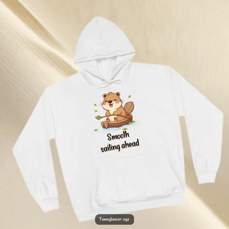 Funny hoodie featuring a joyful beaver paddling a small raft made of leaves, exuding a sense of cheerful exploration and comfort.